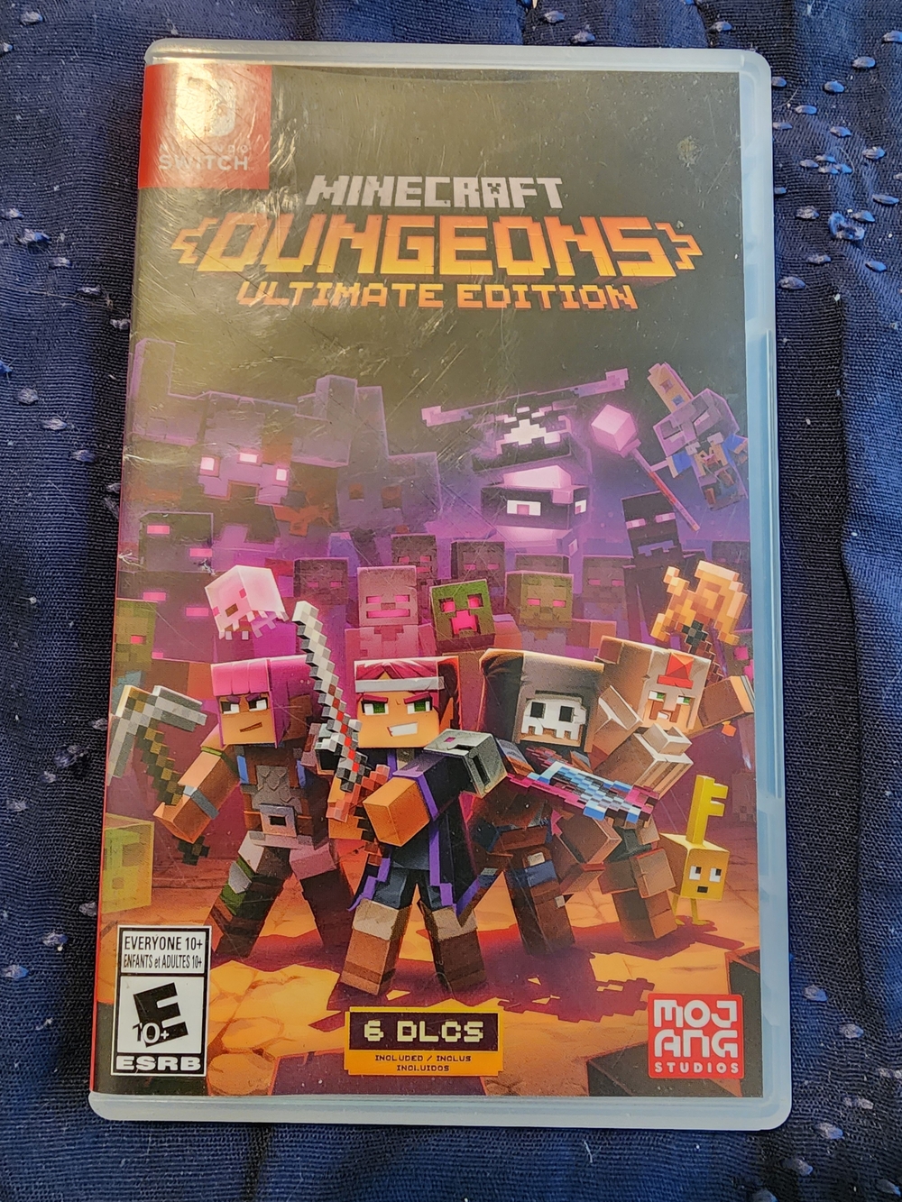 Nintendo Switch Minecraft Dungeons Ultimate Edition - Purple and Orange Cover
